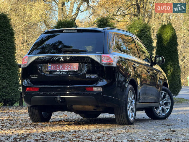 Чорний Міцубісі Аутлендер, об'ємом двигуна 2 л та пробігом 173 тис. км за 15299 $, фото 44 на Automoto.ua