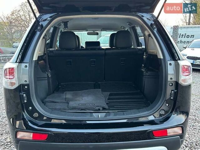 Чорний Міцубісі Аутлендер, об'ємом двигуна 2.4 л та пробігом 199 тис. км за 12800 $, фото 27 на Automoto.ua