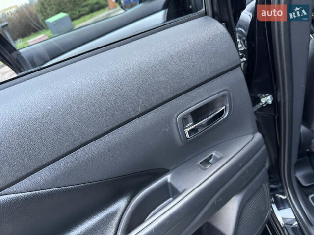 Чорний Міцубісі Аутлендер, об'ємом двигуна 2 л та пробігом 157 тис. км за 15299 $, фото 93 на Automoto.ua