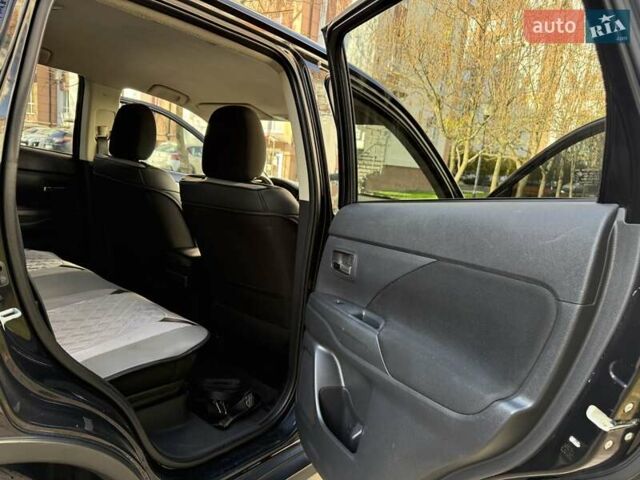 Черный Мицубиси Аутлендер, объемом двигателя 2.4 л и пробегом 270 тыс. км за 12500 $, фото 28 на Automoto.ua