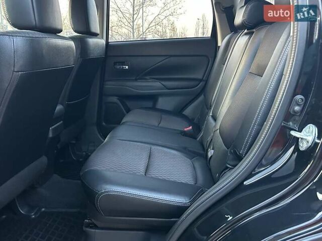Чорний Міцубісі Аутлендер, об'ємом двигуна 2.4 л та пробігом 199 тис. км за 12800 $, фото 26 на Automoto.ua