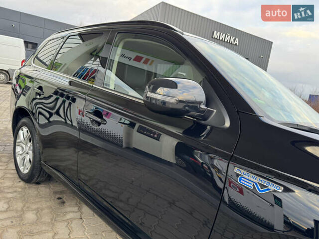 Чорний Міцубісі Аутлендер, об'ємом двигуна 2 л та пробігом 157 тис. км за 15299 $, фото 13 на Automoto.ua