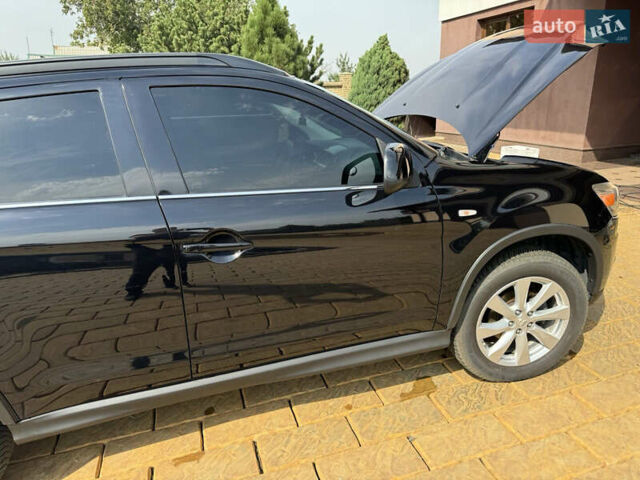 Чорний Міцубісі Аутлендер, об'ємом двигуна 2 л та пробігом 211 тис. км за 9500 $, фото 4 на Automoto.ua