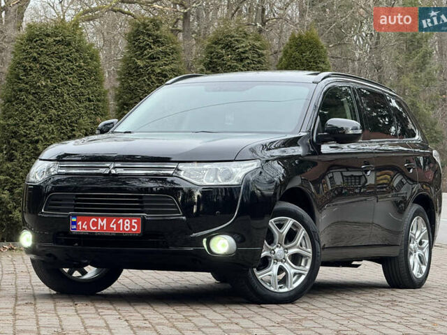 Черный Мицубиси Аутлендер, объемом двигателя 2 л и пробегом 173 тыс. км за 15299 $, фото 17 на Automoto.ua