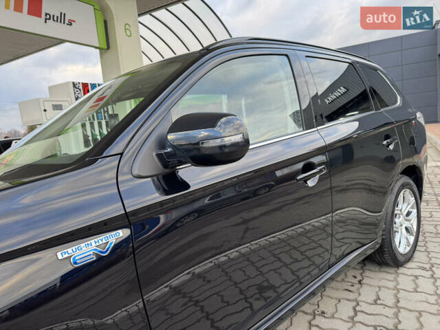 Чорний Міцубісі Аутлендер, об'ємом двигуна 2 л та пробігом 157 тис. км за 15299 $, фото 32 на Automoto.ua