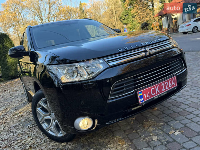Чорний Міцубісі Аутлендер, об'ємом двигуна 2 л та пробігом 173 тис. км за 15299 $, фото 5 на Automoto.ua