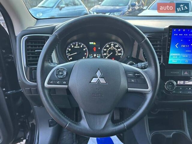 Чорний Міцубісі Аутлендер, об'ємом двигуна 2.4 л та пробігом 199 тис. км за 12800 $, фото 13 на Automoto.ua