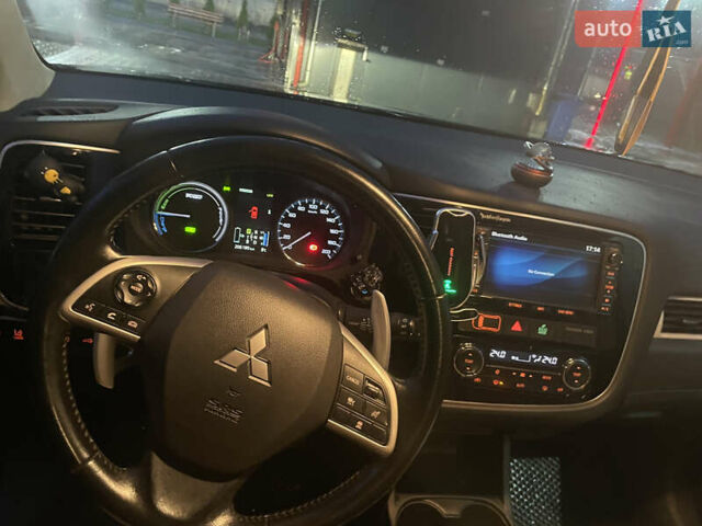 Черный Мицубиси Аутлендер, объемом двигателя 2 л и пробегом 206 тыс. км за 14500 $, фото 9 на Automoto.ua
