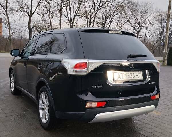 Чорний Міцубісі Аутлендер, об'ємом двигуна 2.4 л та пробігом 224 тис. км за 12000 $, фото 13 на Automoto.ua