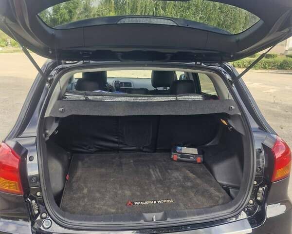 Чорний Міцубісі Аутлендер, об'ємом двигуна 2 л та пробігом 83 тис. км за 13500 $, фото 2 на Automoto.ua