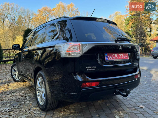 Чорний Міцубісі Аутлендер, об'ємом двигуна 2 л та пробігом 173 тис. км за 15299 $, фото 64 на Automoto.ua