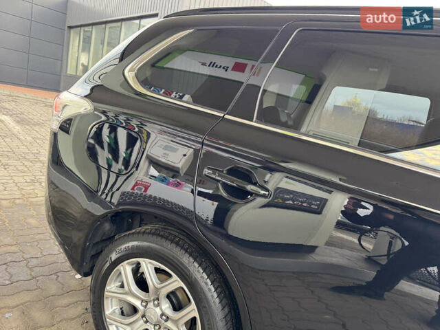 Чорний Міцубісі Аутлендер, об'ємом двигуна 2 л та пробігом 157 тис. км за 15299 $, фото 18 на Automoto.ua