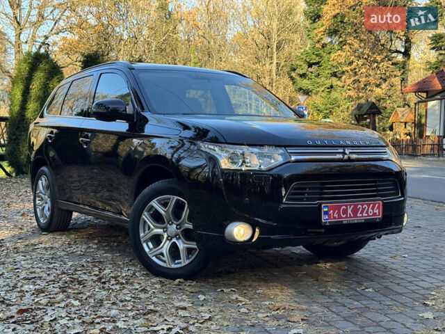 Чорний Міцубісі Аутлендер, об'ємом двигуна 2 л та пробігом 173 тис. км за 15299 $, фото 3 на Automoto.ua