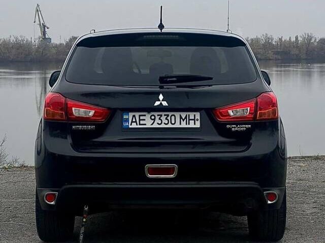 Чорний Міцубісі Аутлендер, об'ємом двигуна 2 л та пробігом 250 тис. км за 10800 $, фото 9 на Automoto.ua