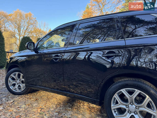 Чорний Міцубісі Аутлендер, об'ємом двигуна 2 л та пробігом 173 тис. км за 15299 $, фото 73 на Automoto.ua