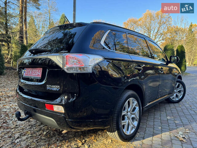 Чорний Міцубісі Аутлендер, об'ємом двигуна 2 л та пробігом 173 тис. км за 15299 $, фото 54 на Automoto.ua