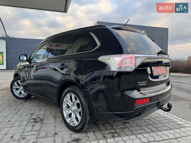 Чорний Міцубісі Аутлендер, об'ємом двигуна 2 л та пробігом 157 тис. км за 15299 $, фото 62 на Automoto.ua