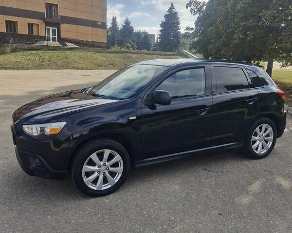 Чорний Міцубісі Аутлендер, об'ємом двигуна 2 л та пробігом 83 тис. км за 13500 $, фото 6 на Automoto.ua