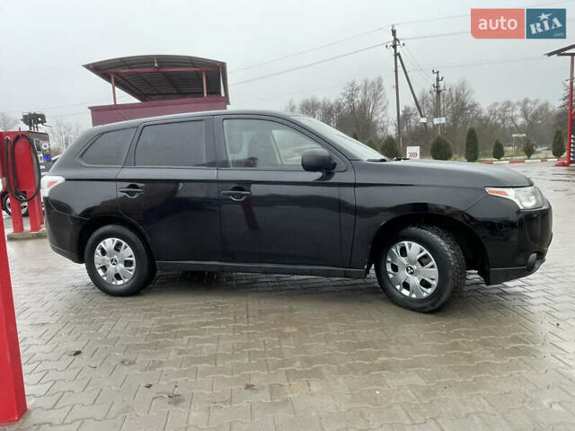 Чорний Міцубісі Аутлендер, об'ємом двигуна 2.4 л та пробігом 150 тис. км за 12200 $, фото 3 на Automoto.ua