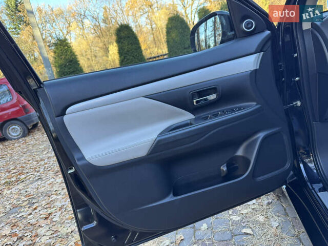 Чорний Міцубісі Аутлендер, об'ємом двигуна 2 л та пробігом 173 тис. км за 15299 $, фото 76 на Automoto.ua