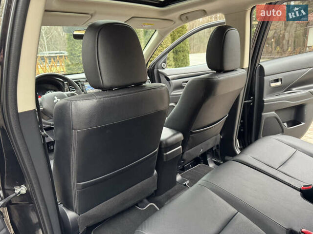 Черный Мицубиси Аутлендер, объемом двигателя 2 л и пробегом 173 тыс. км за 15299 $, фото 96 на Automoto.ua