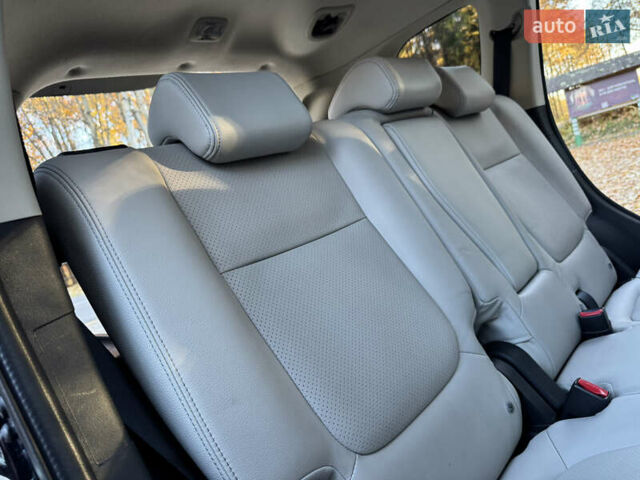 Чорний Міцубісі Аутлендер, об'ємом двигуна 2 л та пробігом 173 тис. км за 15299 $, фото 119 на Automoto.ua