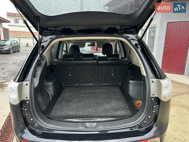 Черный Мицубиси Аутлендер, объемом двигателя 2 л и пробегом 223 тыс. км за 13400 $, фото 13 на Automoto.ua