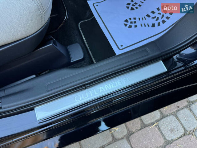 Чорний Міцубісі Аутлендер, об'ємом двигуна 2 л та пробігом 173 тис. км за 15299 $, фото 97 на Automoto.ua