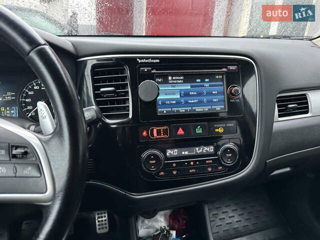 Черный Мицубиси Аутлендер, объемом двигателя 2 л и пробегом 223 тыс. км за 13400 $, фото 17 на Automoto.ua