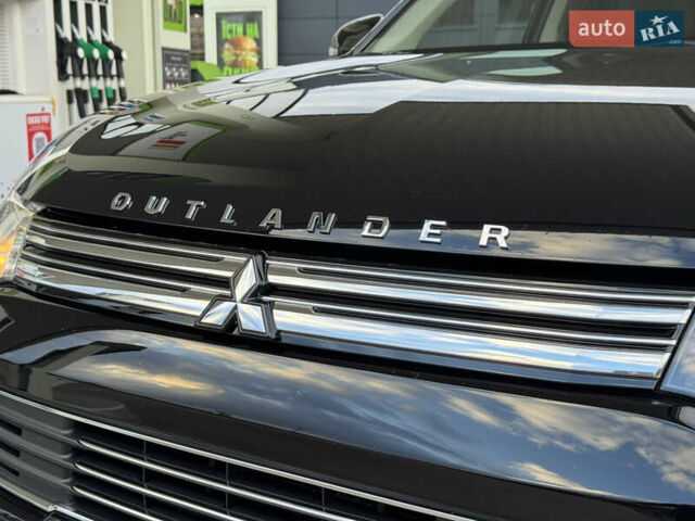 Чорний Міцубісі Аутлендер, об'ємом двигуна 2 л та пробігом 157 тис. км за 15299 $, фото 27 на Automoto.ua