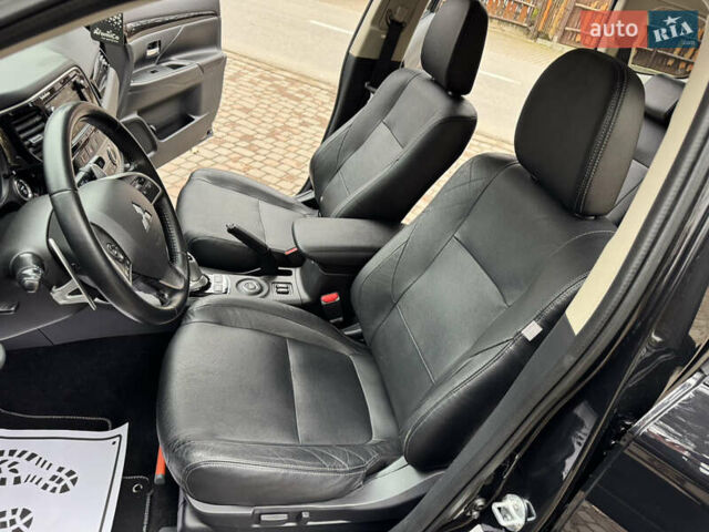 Черный Мицубиси Аутлендер, объемом двигателя 2 л и пробегом 173 тыс. км за 15299 $, фото 67 на Automoto.ua