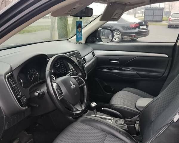 Чорний Міцубісі Аутлендер, об'ємом двигуна 2.4 л та пробігом 224 тис. км за 12000 $, фото 17 на Automoto.ua