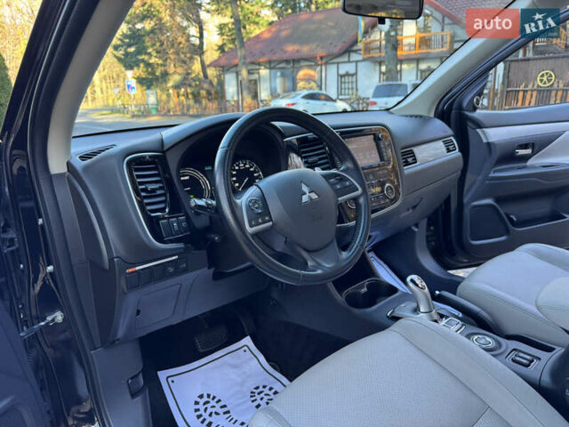 Чорний Міцубісі Аутлендер, об'ємом двигуна 2 л та пробігом 173 тис. км за 15299 $, фото 83 на Automoto.ua