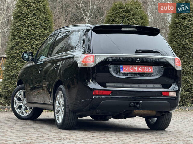 Черный Мицубиси Аутлендер, объемом двигателя 2 л и пробегом 173 тыс. км за 15299 $, фото 51 на Automoto.ua