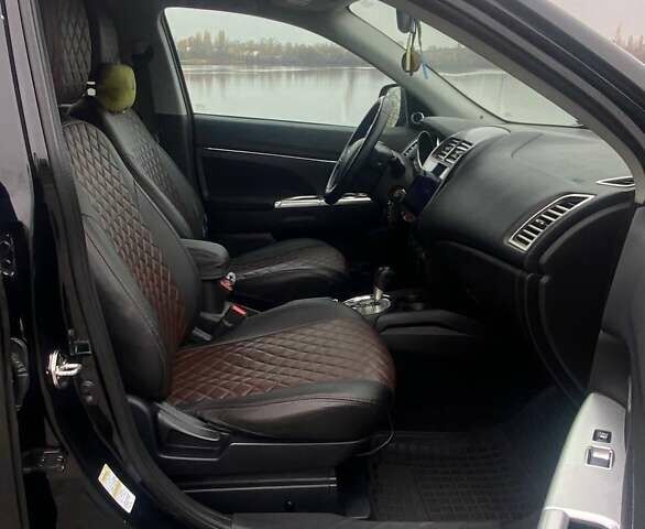 Чорний Міцубісі Аутлендер, об'ємом двигуна 2 л та пробігом 250 тис. км за 10800 $, фото 18 на Automoto.ua