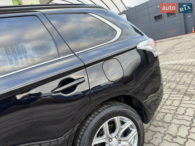 Чорний Міцубісі Аутлендер, об'ємом двигуна 2 л та пробігом 157 тис. км за 15299 $, фото 36 на Automoto.ua