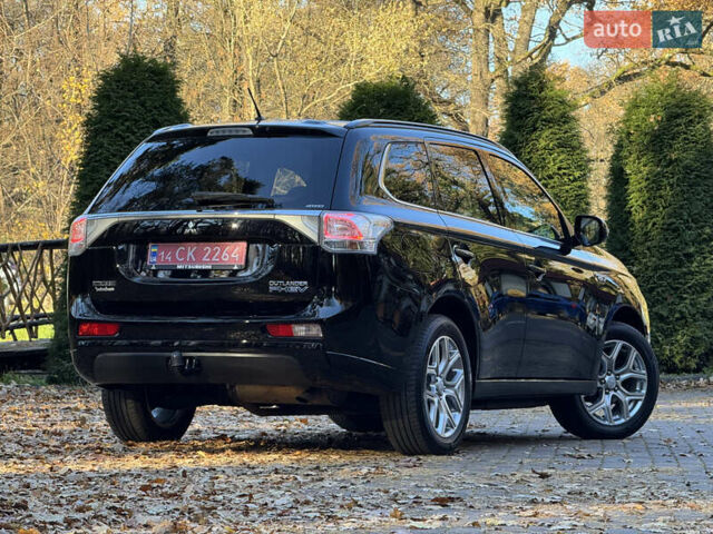 Чорний Міцубісі Аутлендер, об'ємом двигуна 2 л та пробігом 173 тис. км за 15299 $, фото 43 на Automoto.ua