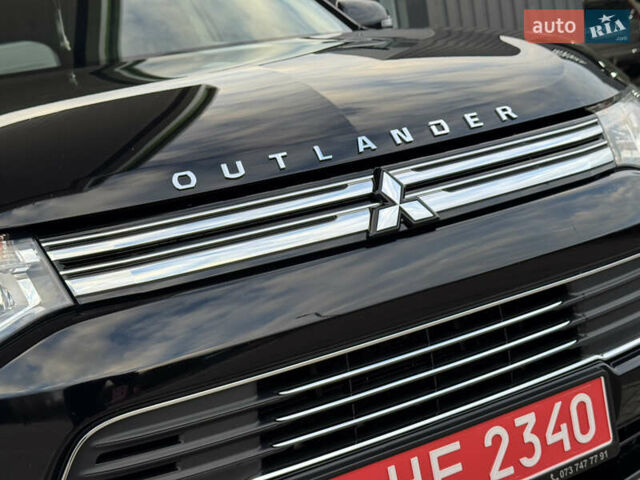 Чорний Міцубісі Аутлендер, об'ємом двигуна 2 л та пробігом 157 тис. км за 15299 $, фото 8 на Automoto.ua