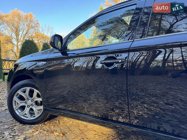 Чорний Міцубісі Аутлендер, об'ємом двигуна 2 л та пробігом 173 тис. км за 15299 $, фото 74 на Automoto.ua