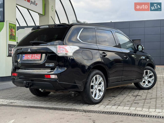 Чорний Міцубісі Аутлендер, об'ємом двигуна 2 л та пробігом 157 тис. км за 15299 $, фото 40 на Automoto.ua