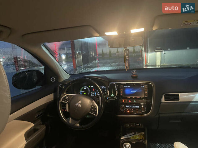 Черный Мицубиси Аутлендер, объемом двигателя 2 л и пробегом 206 тыс. км за 14500 $, фото 14 на Automoto.ua