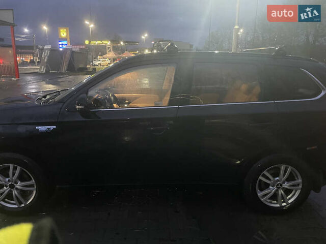 Черный Мицубиси Аутлендер, объемом двигателя 2 л и пробегом 206 тыс. км за 14500 $, фото 8 на Automoto.ua