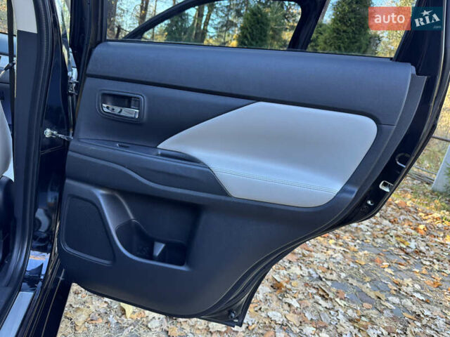 Чорний Міцубісі Аутлендер, об'ємом двигуна 2 л та пробігом 173 тис. км за 15299 $, фото 115 на Automoto.ua