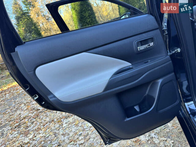 Чорний Міцубісі Аутлендер, об'ємом двигуна 2 л та пробігом 173 тис. км за 15299 $, фото 107 на Automoto.ua