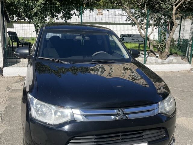 Черный Мицубиси Аутлендер, объемом двигателя 2 л и пробегом 150 тыс. км за 12000 $, фото 7 на Automoto.ua