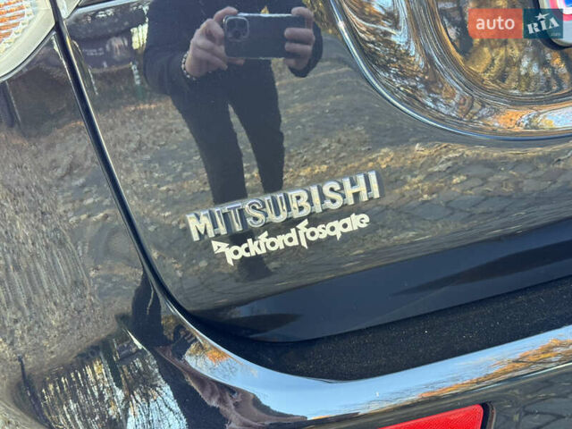Чорний Міцубісі Аутлендер, об'ємом двигуна 2 л та пробігом 173 тис. км за 15299 $, фото 67 на Automoto.ua