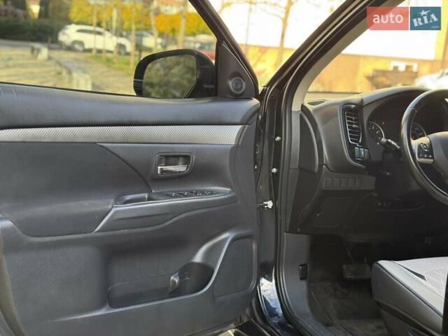 Черный Мицубиси Аутлендер, объемом двигателя 2.4 л и пробегом 270 тыс. км за 12500 $, фото 16 на Automoto.ua