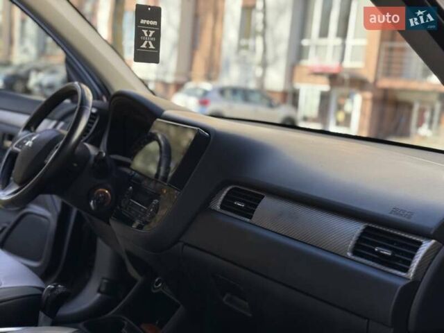 Черный Мицубиси Аутлендер, объемом двигателя 2.4 л и пробегом 270 тыс. км за 12500 $, фото 22 на Automoto.ua