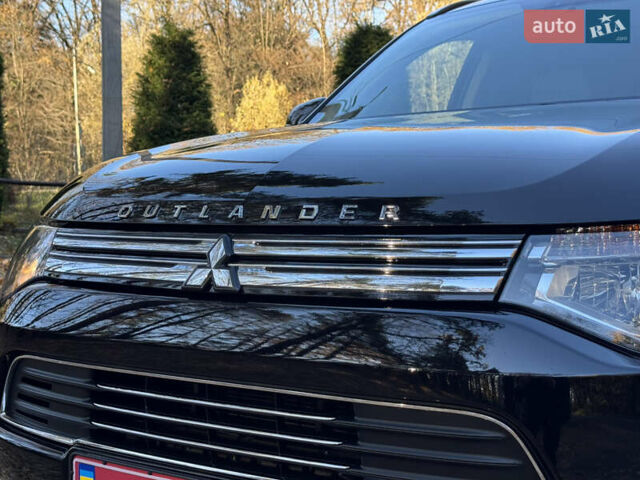 Чорний Міцубісі Аутлендер, об'ємом двигуна 2 л та пробігом 173 тис. км за 15299 $, фото 32 на Automoto.ua