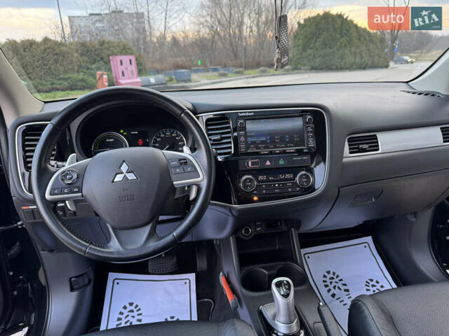 Чорний Міцубісі Аутлендер, об'ємом двигуна 2 л та пробігом 157 тис. км за 15299 $, фото 91 на Automoto.ua